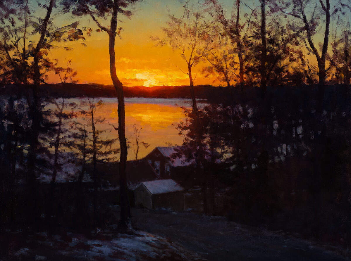 Sun Setting Over A Frozen Lake