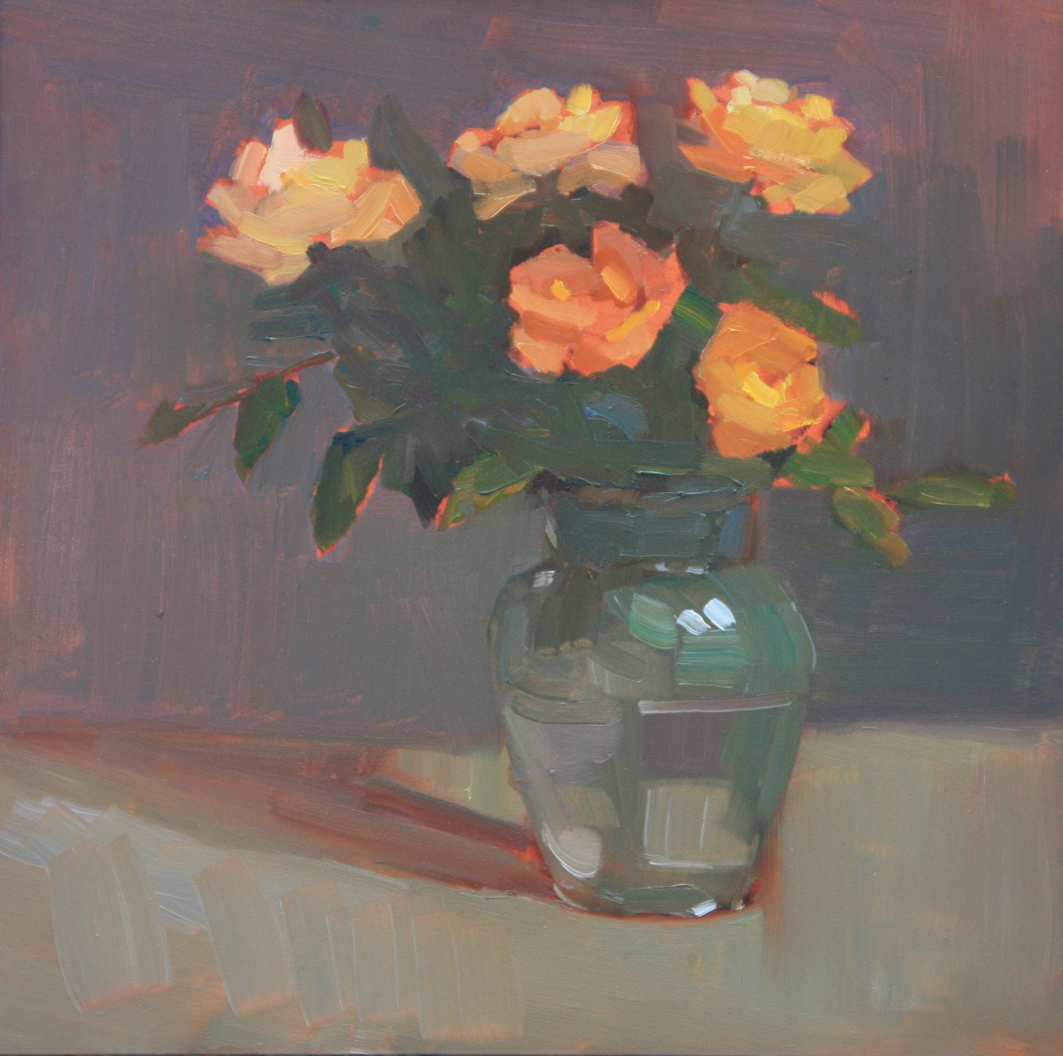 Glass Filled with Orange Roses
